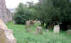 03 ALKHAM Church, graves West of tower.JPG (95379 bytes)